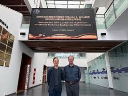 Men standing under a sign AI-generated content may be incorrect.